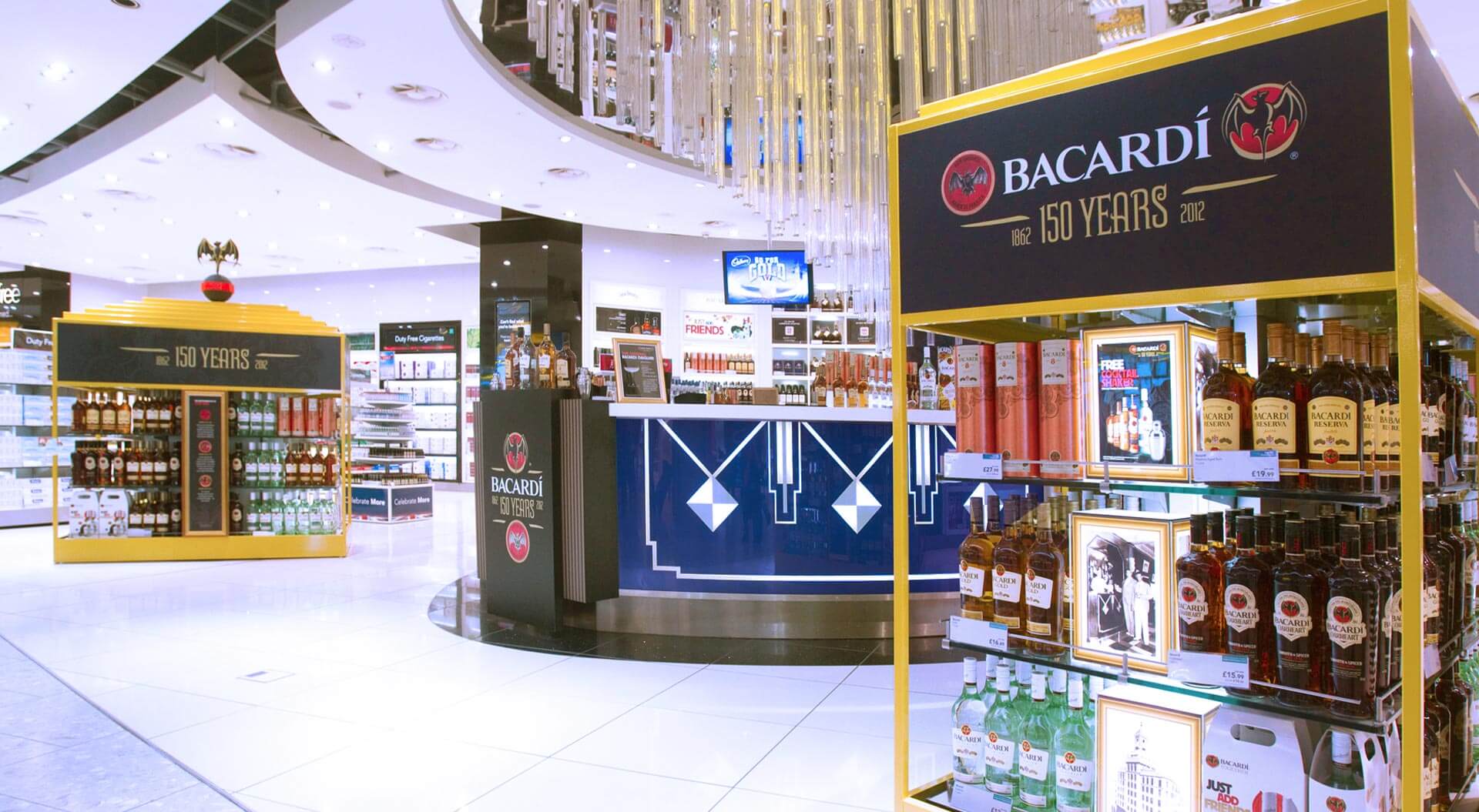 Bacardi 150 Years celebration merchandising system design and store interior World Duty Free Heathrow Terminal 5 branding