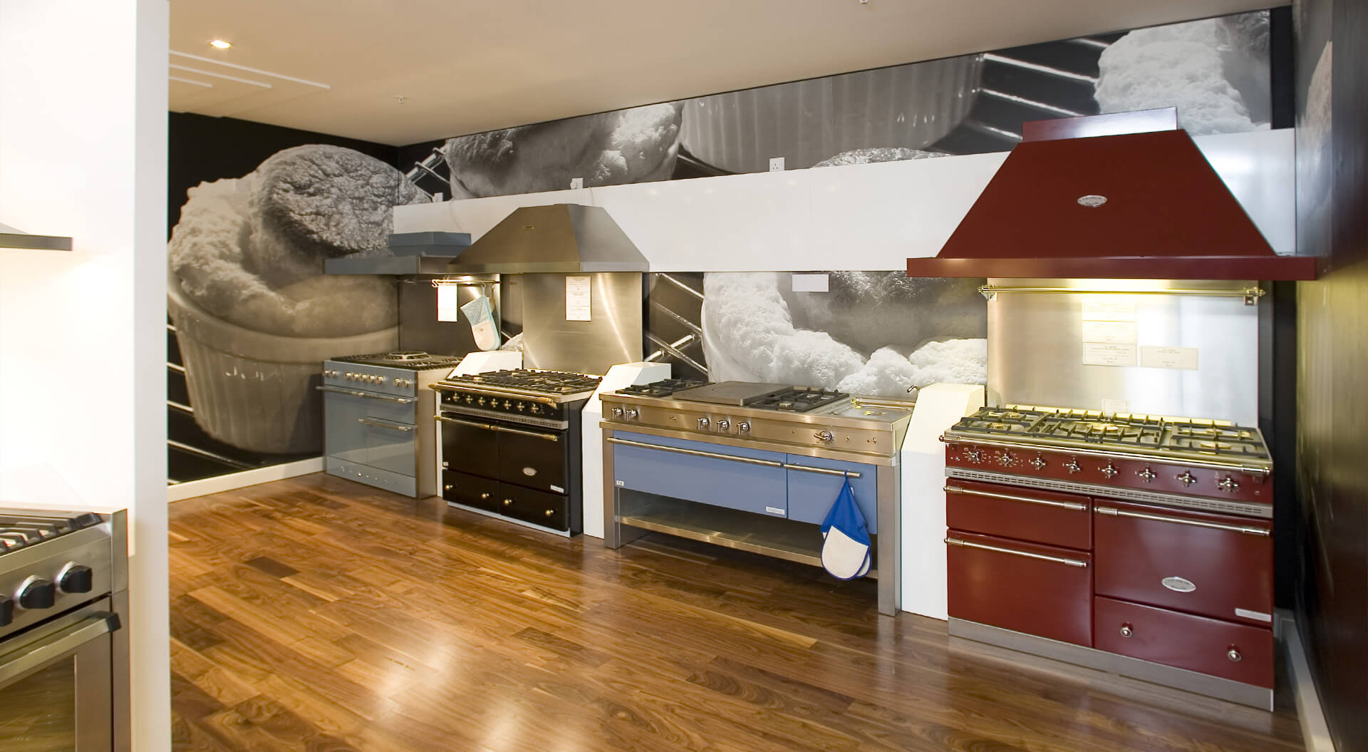 Harrods Department Store rebrand identity, interior design gas cookers and ovens and super graphic wall communication