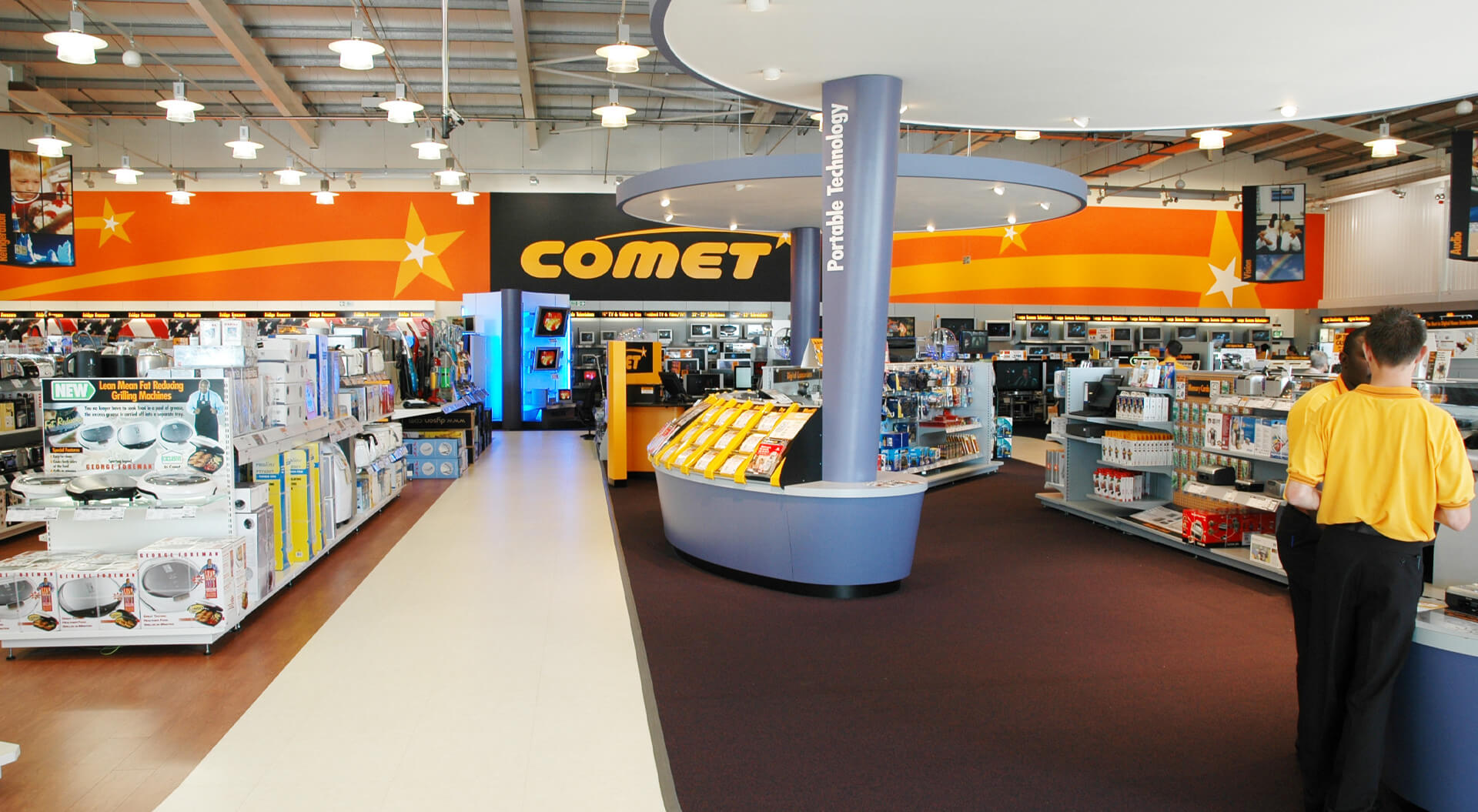 Comet electronic and technology reatil store communications Comet Technology Store rebrand identity, interior design digital camera merchandising display and super graphic wall communication