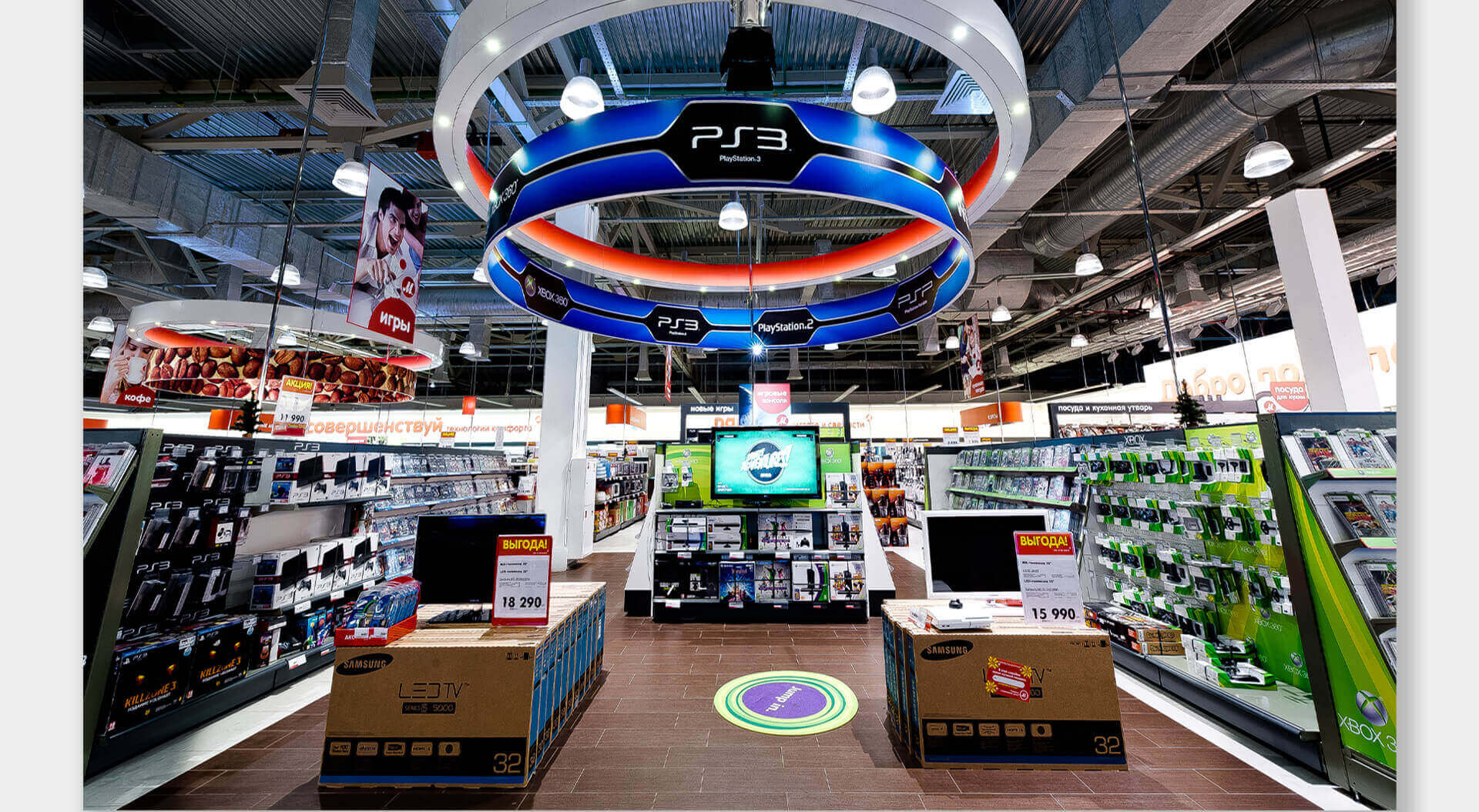 M.Video Russia retail interior store design, brand communications household technology electrical homewares and signage system M.Video Technology Stores rebrand and interior design POSM brand communications Games station
