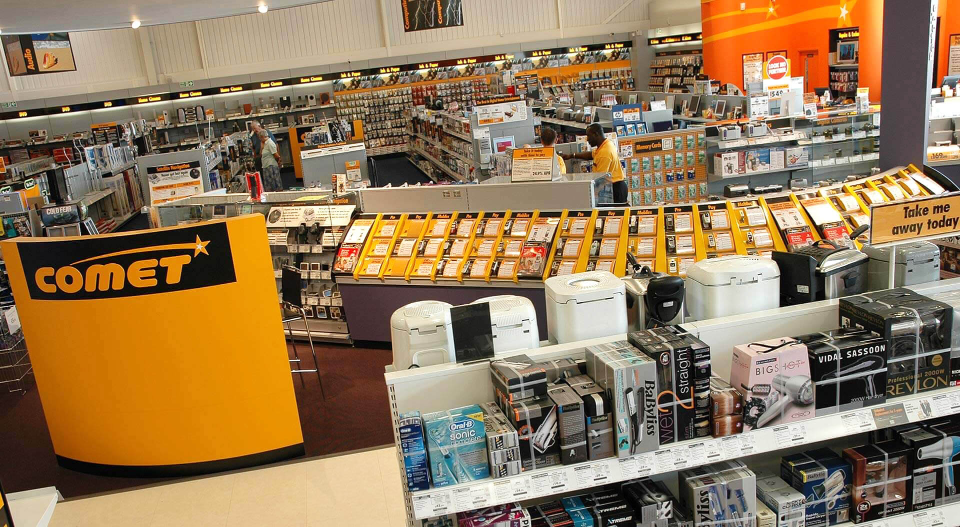 Comet electronic and technology reatil store design customer service desk Comet Technology Store rebrand and interior design consultation point