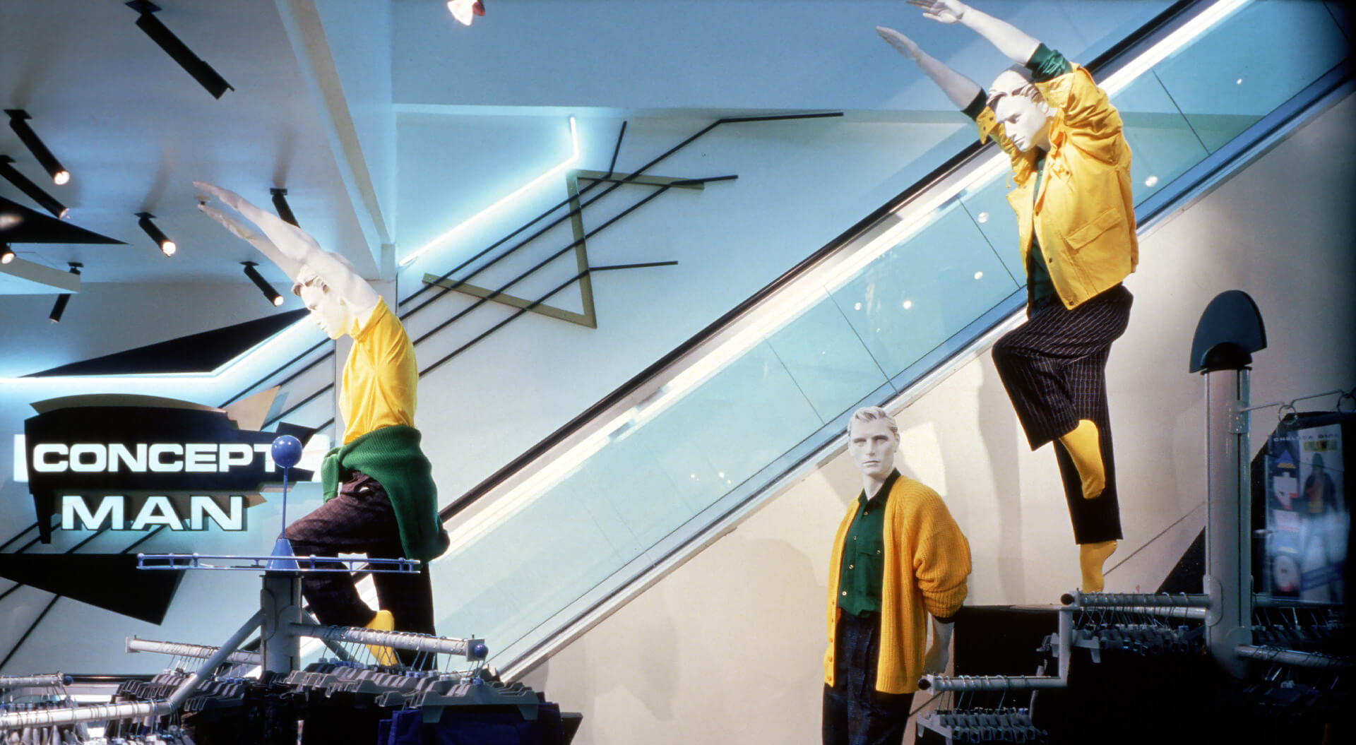 Concept Man fashion store brand interior  internal brand signage for shop escalators design merchandising systems