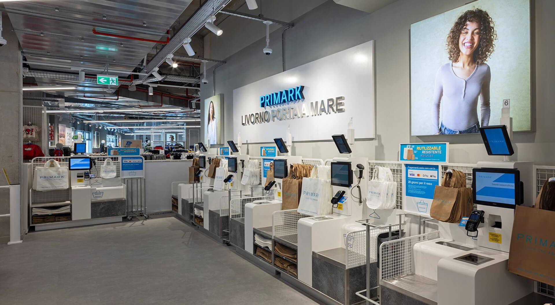 Primark self service cash points interior design and graphic branding
