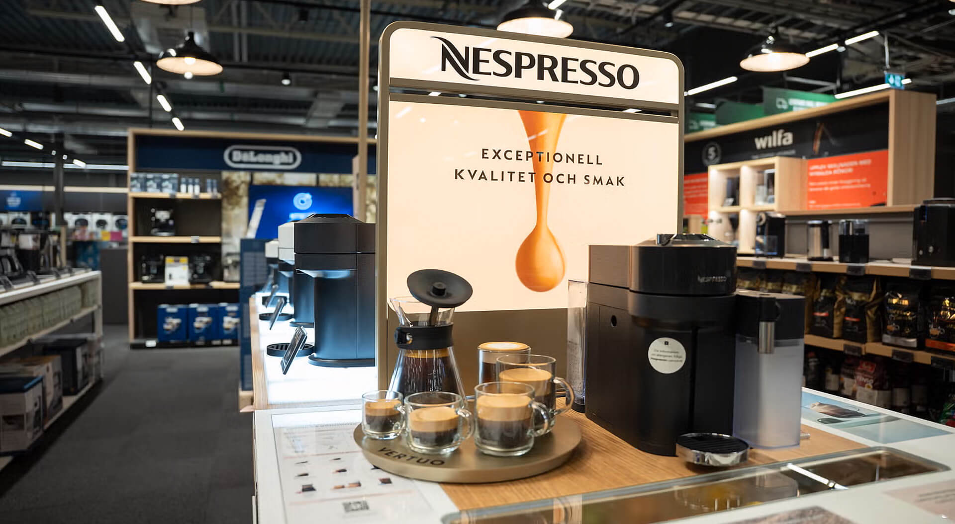 Elgiganten Nespresso Merchandising System Design and Branding Concept