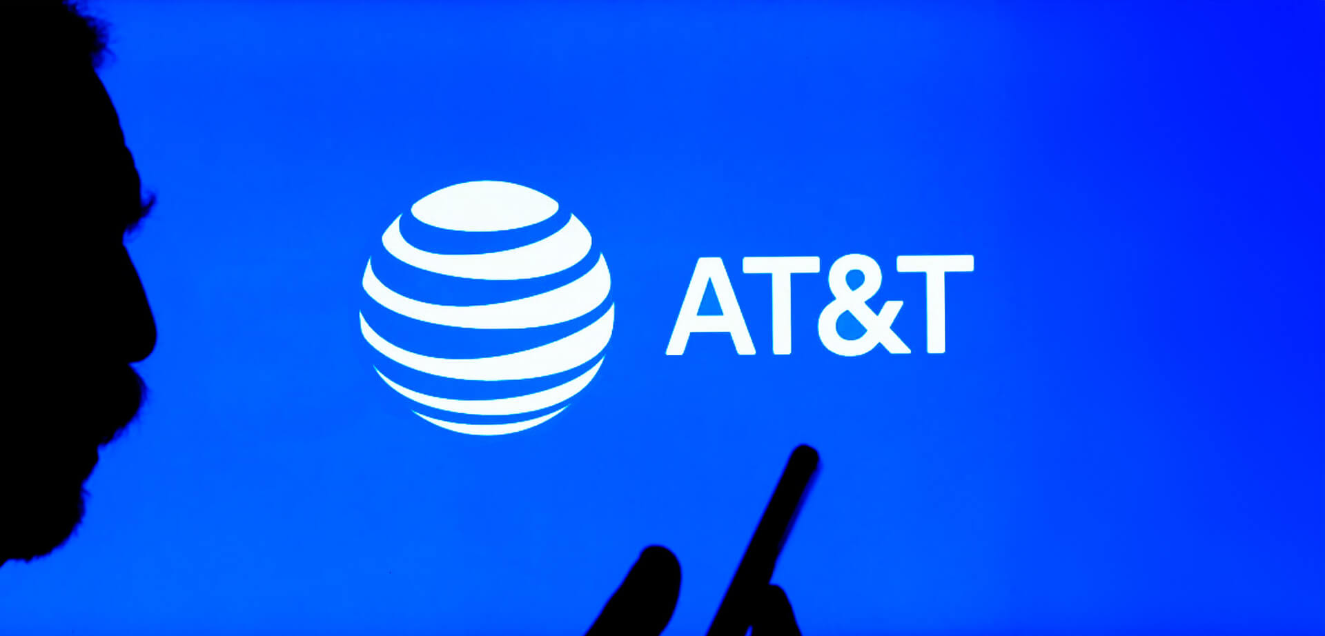 AT&T logo and a slogan from a design consultancy. AT&T is a major global telecommunications company.