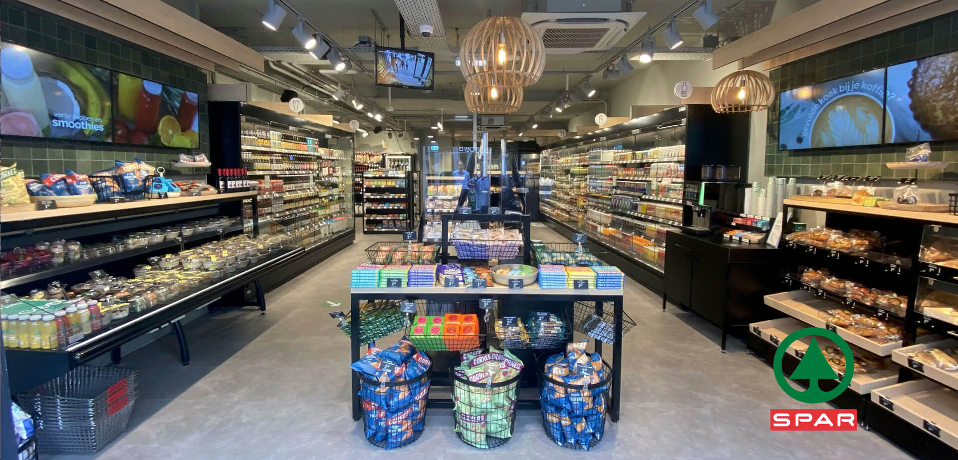 The interior of a SPAR City Store, a type of convenience store or small supermarket.