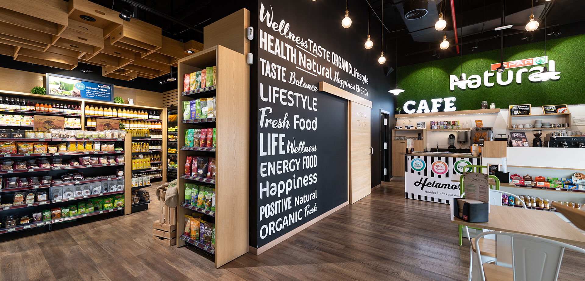 This image depicts the interior of Spar Natural. The store focuses on organic, natural, and fresh food products, promoting a healthy lifestyle.