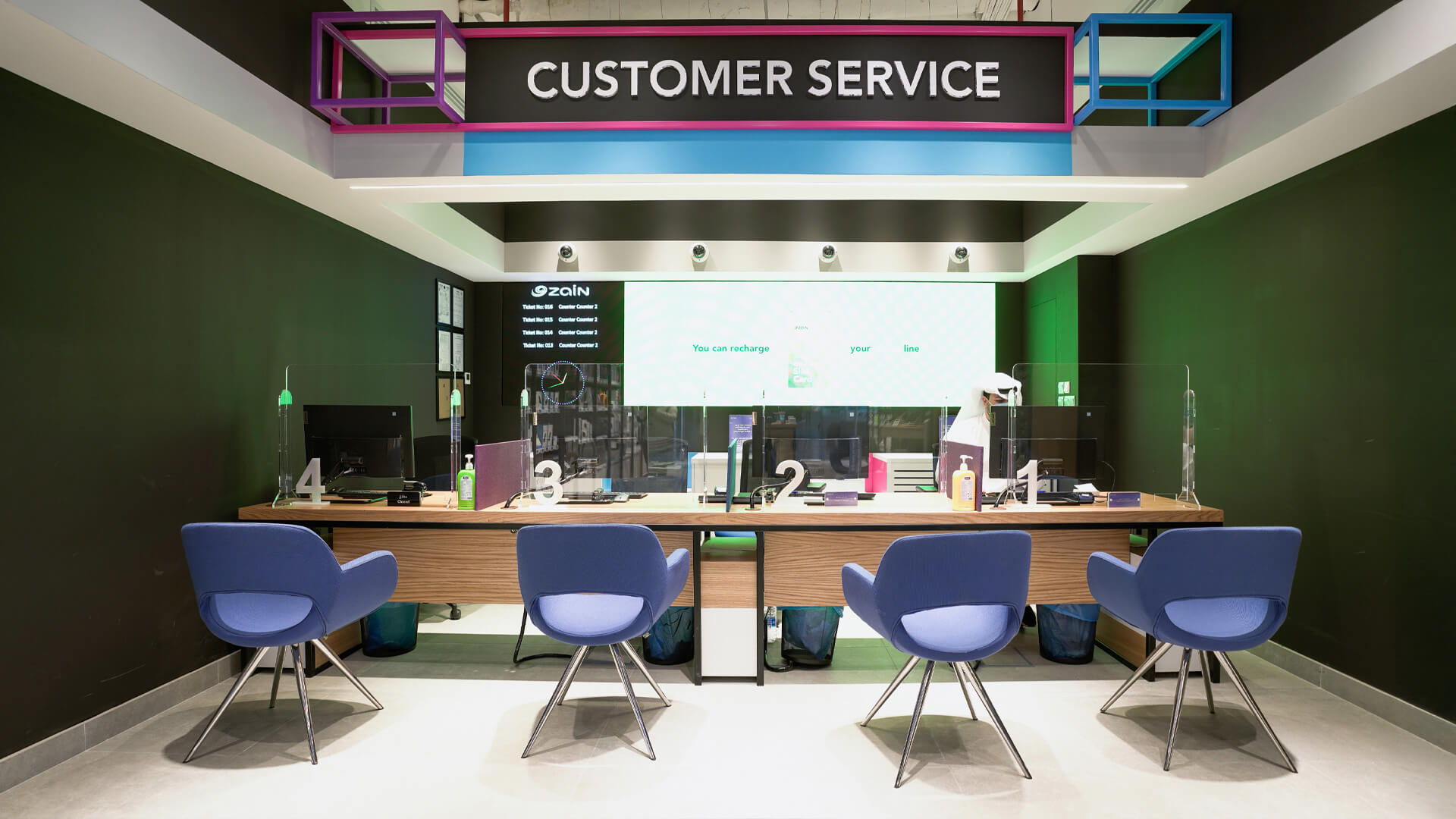 Zain Telecom store featuring the customer service desk concept.