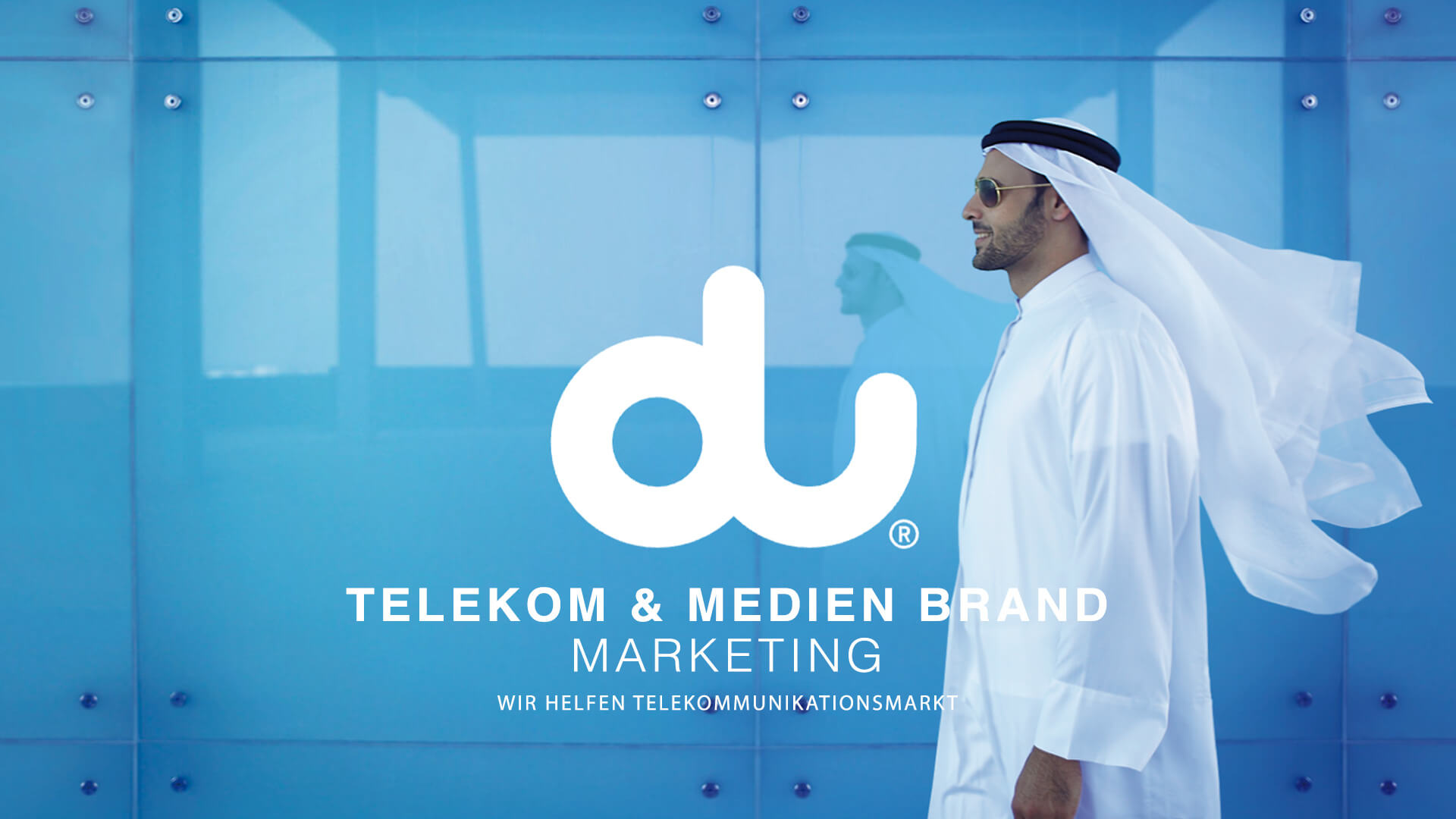 This image shows a promotional scene for du, a major telecommunications operator in the United Arab Emirates.