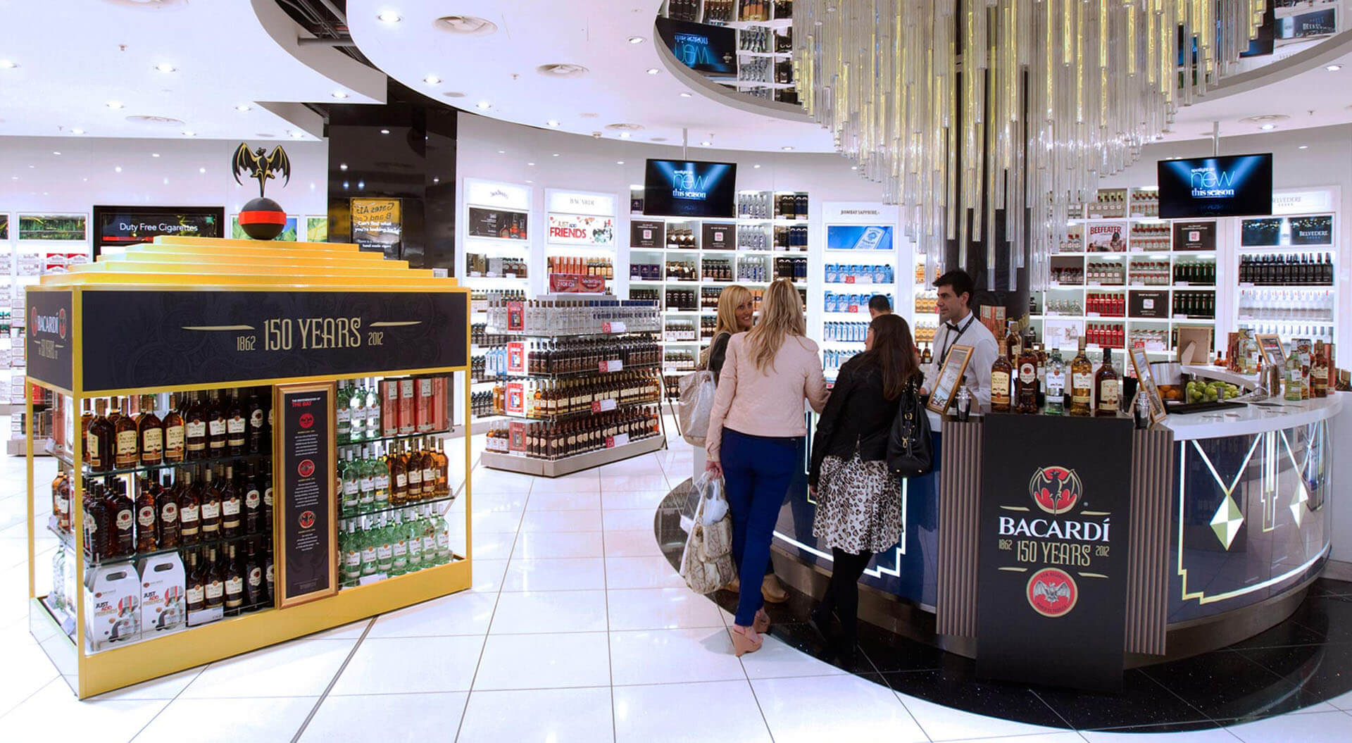 Bacardi 150 Years celebration merchandising system design and store interior World Duty Free Heathrow Terminal 5 branding Bacardi 150 Years celebration merchandising system design and store interior World Duty Free Heathrow Terminal 5 branding