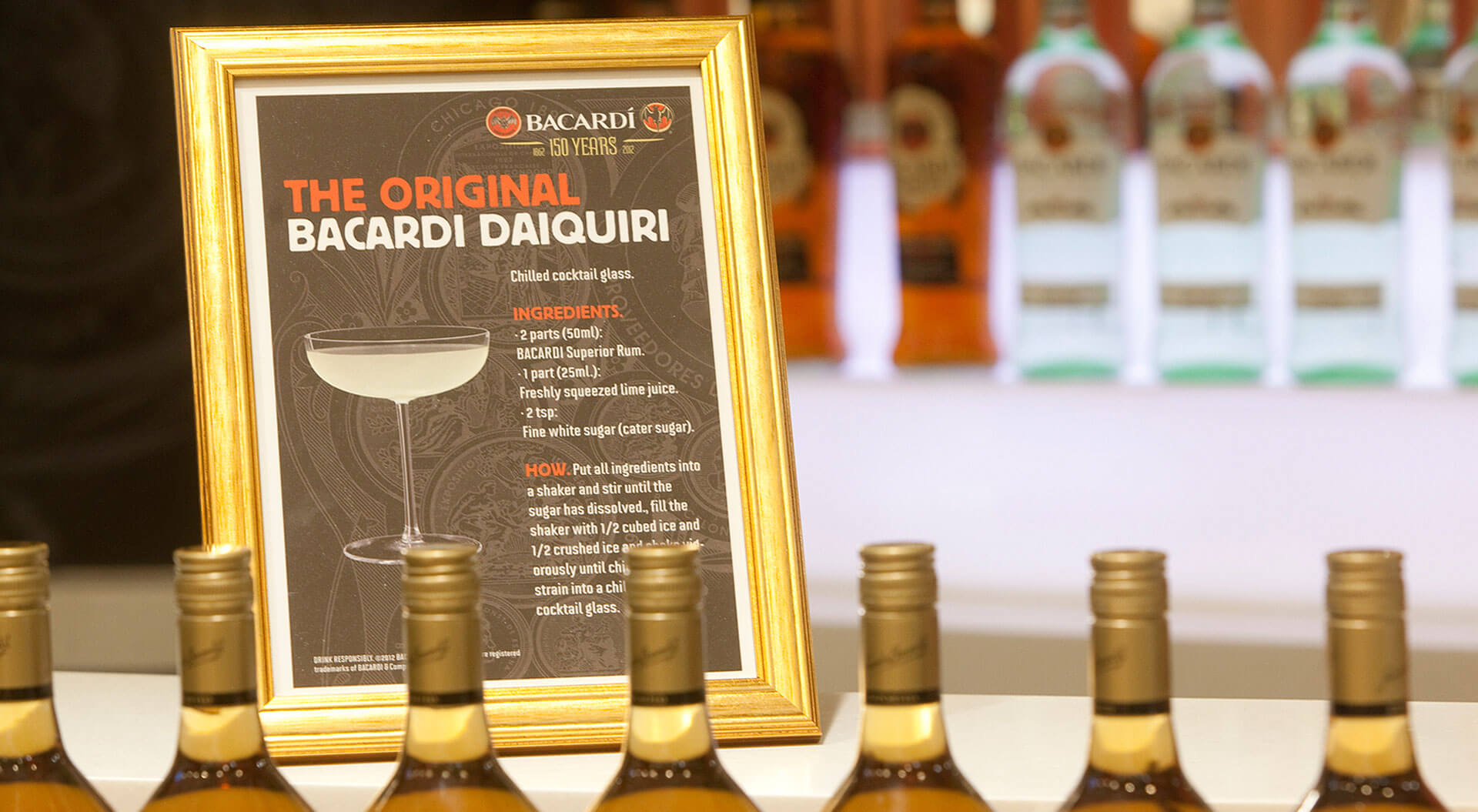 Bacardi 150 Years celebration merchandising system design and store interior World Duty Free Heathrow Terminal 5 graphic promotions Bacardi 150 Years celebration merchandising system design and store interior World Duty Free Heathrow Terminal 5 graphic promotions