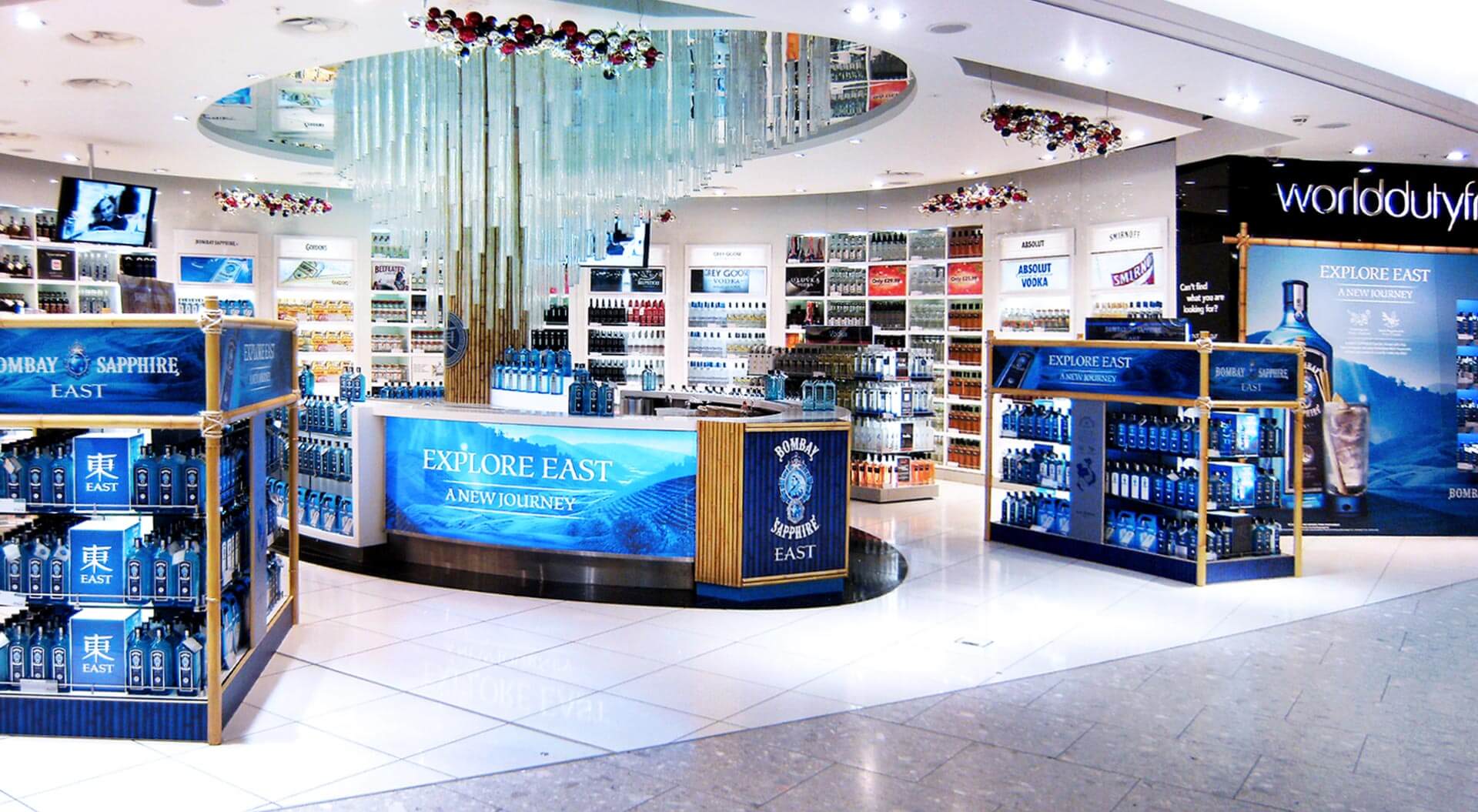 Bombay Sapphire East store design and branding for World Duty Free Heathrow Terminal 5 airport Bombay Sapphire East store design and branding for World Duty Free Heathrow Terminal 5 airport