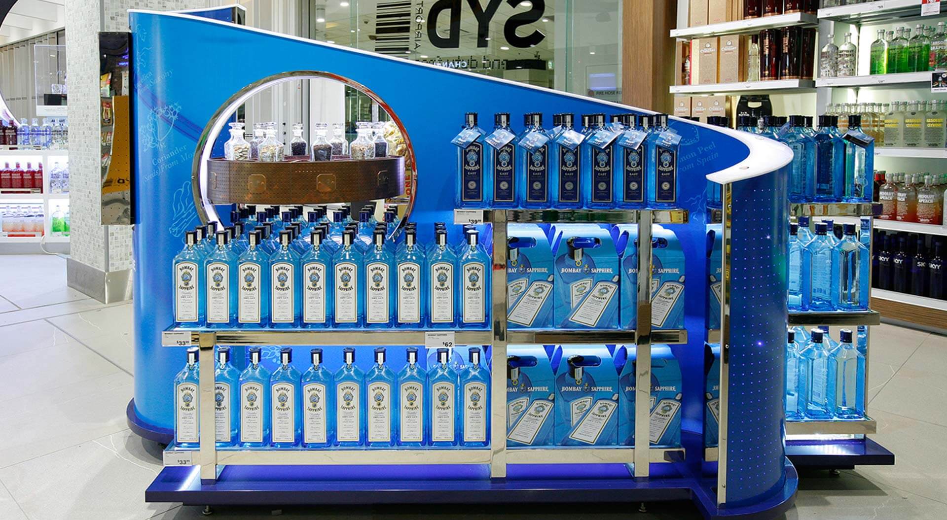 Bacardi Bombay Sapphire spirits industry promotion merchandising systems design at Sydney airport for duty free travel retail