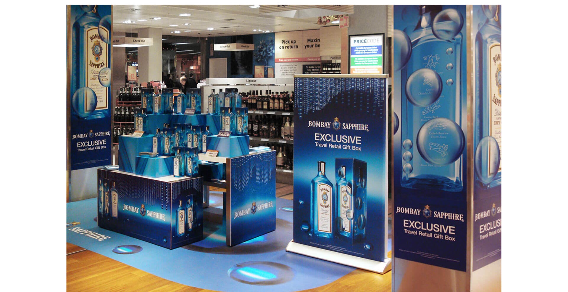 Bombay Sapphire Reign merchandising display branding and promotion campaigns travel retail in airports Bombay Sapphire Reign merchandising display branding and promotion campaigns travel retail in airports