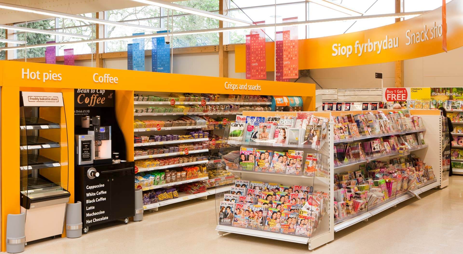 Tesco supermarket snack shop, coffee and magazine merchandising system and brand communications Tesco supermarket snack shop, coffee and magazine merchandising system and brand communications